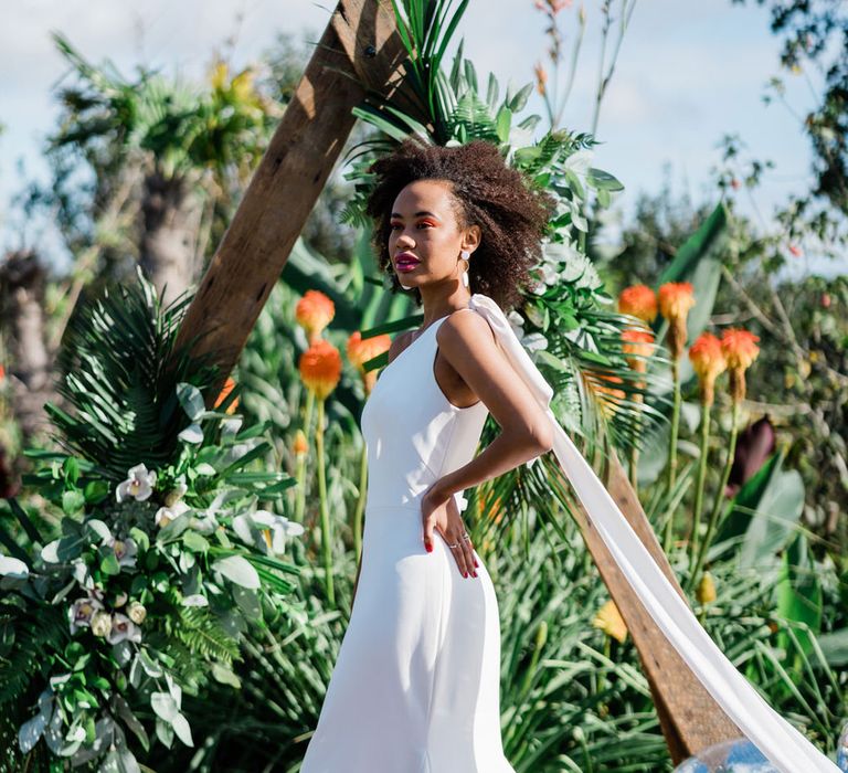 Bride in minimalist Maddox wedding dress in the botanical garden at Urban Jungle Suffolk