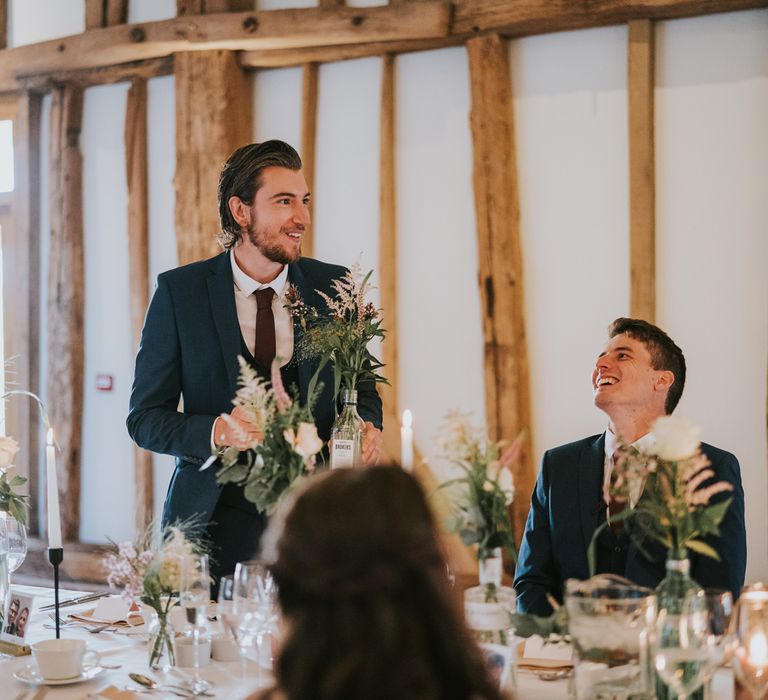 Wedding guest makes a speech during reception 