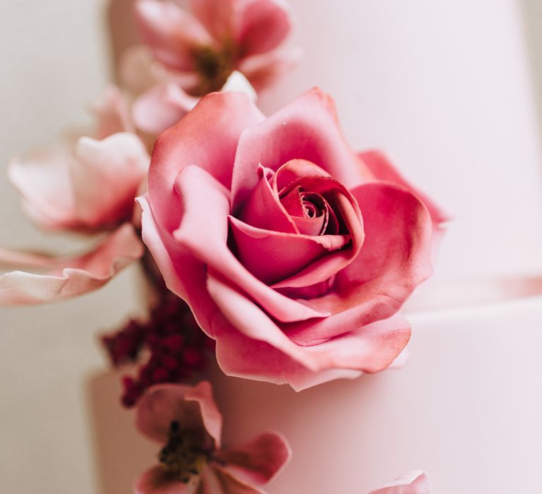 Pink iced flowers for wedding cake 