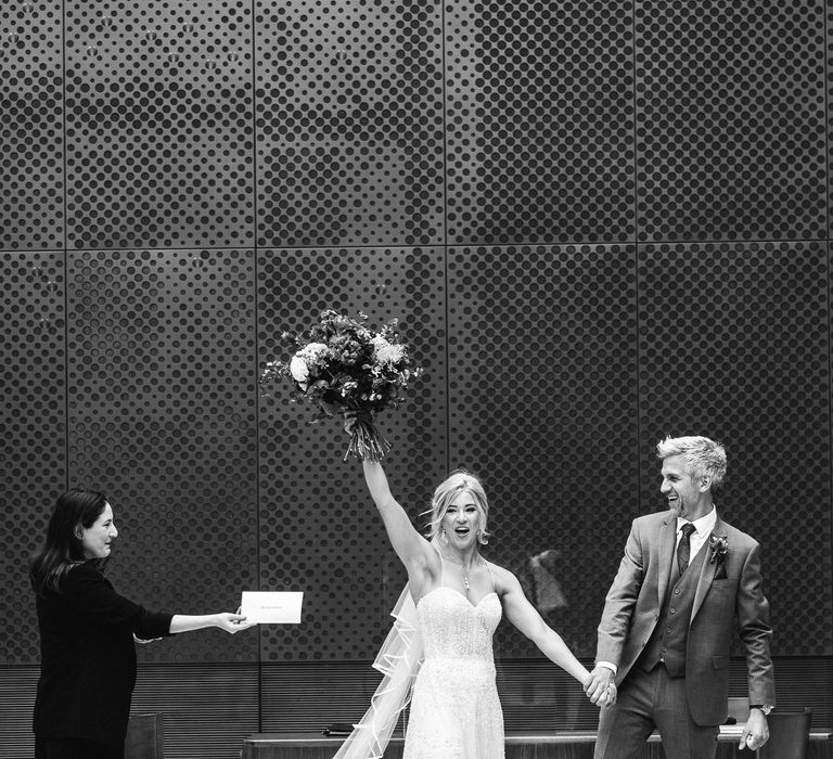 Bride celebrates after wedding ceremony