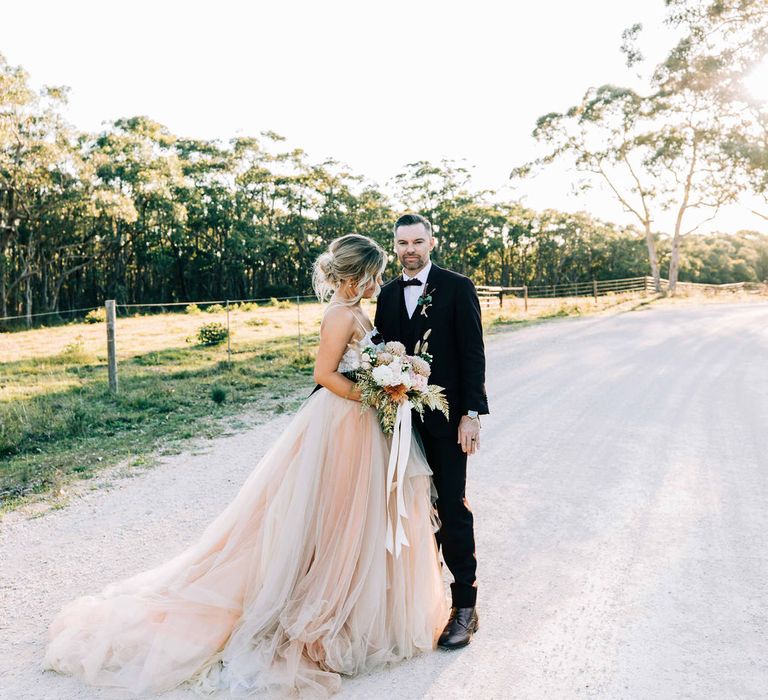 Blush tulle skirt wedding dress for bride