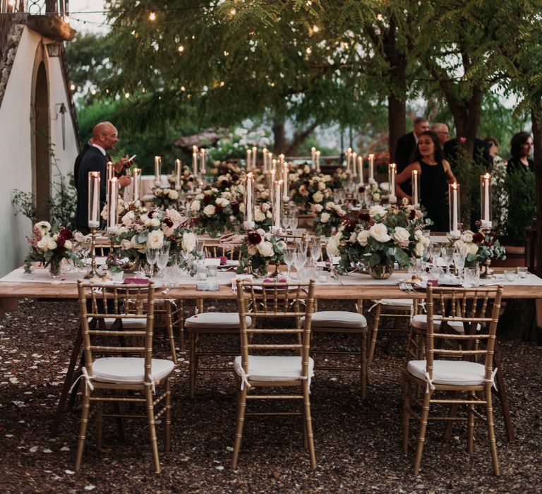 Wooden rustic Italian table settings for outdoor reception