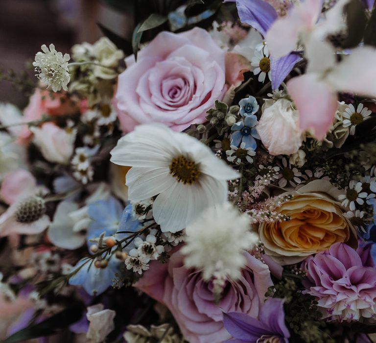 Pink, blue and white pastel wedding bouquet with summer florals for rustic wedding