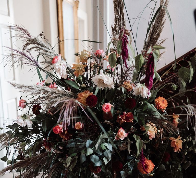 Mixed dried luxe floral display for autumn wedding at Iscoyd Park