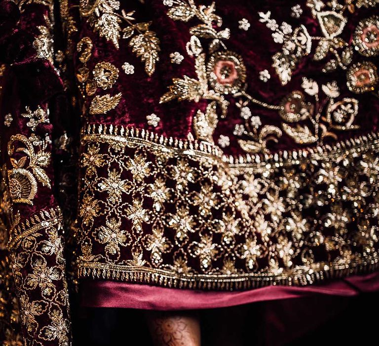 Embroidered gold detailed burgundy wedding dress 