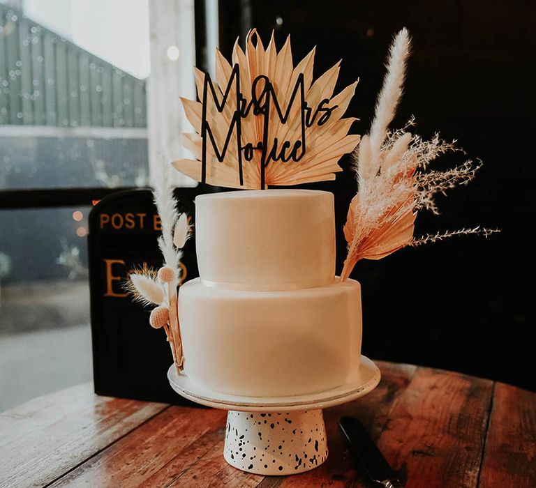 Modern wedding cake with personalised cake topper