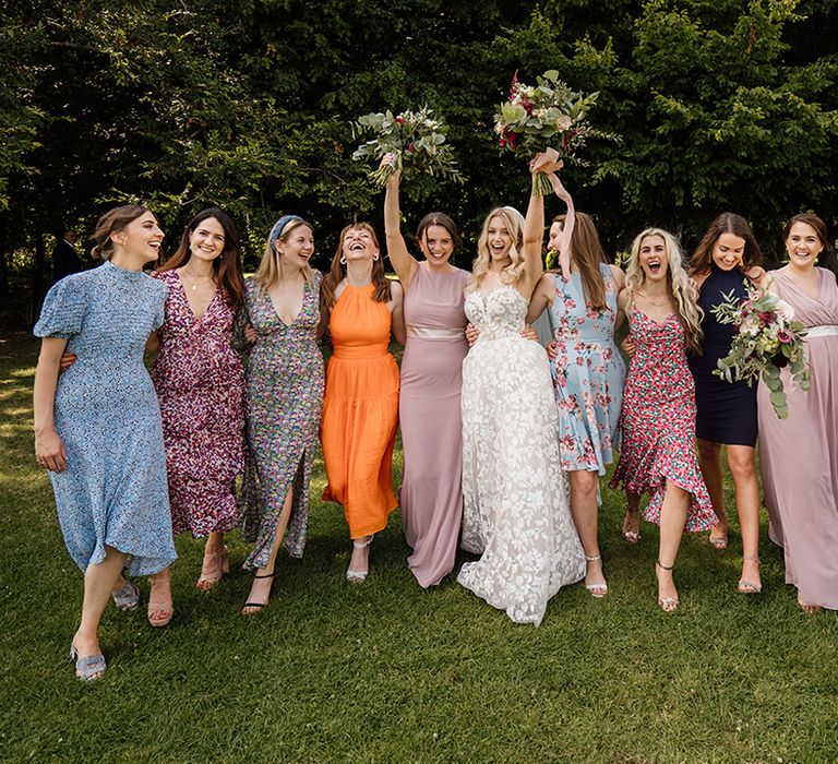 Bride walks with the bridal party 