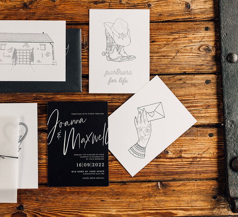 Black and white minimal wedding stationery with cute graphic black and white drawings 