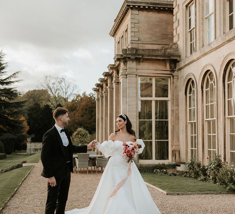 Prestwold Hall country house wedding venue in Leicestershire with bride and groom in back tie dress code 