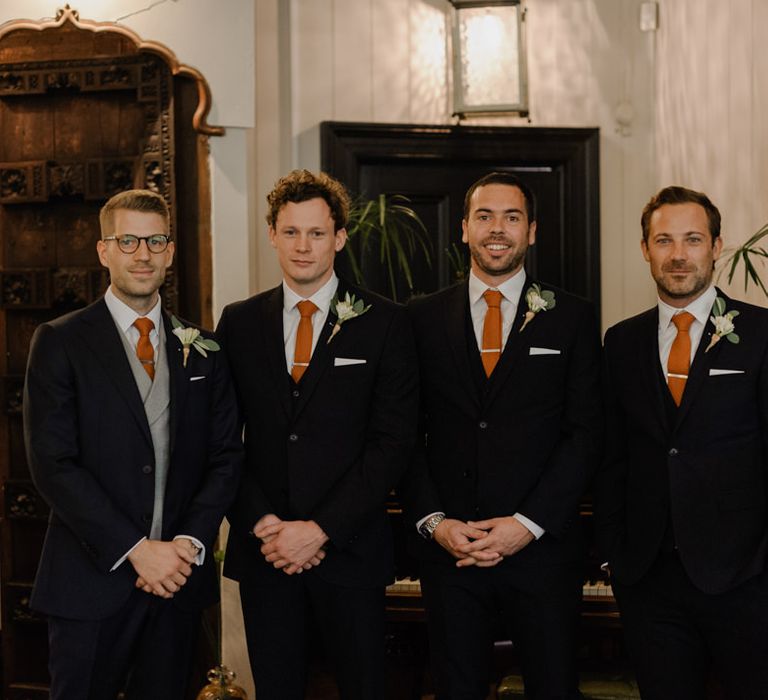 Groom and groomsmen await the bride's arrival