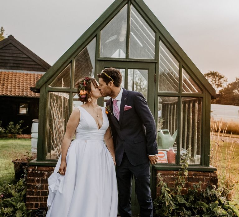 Bride and groom portrait by Camilla Andrea Photography