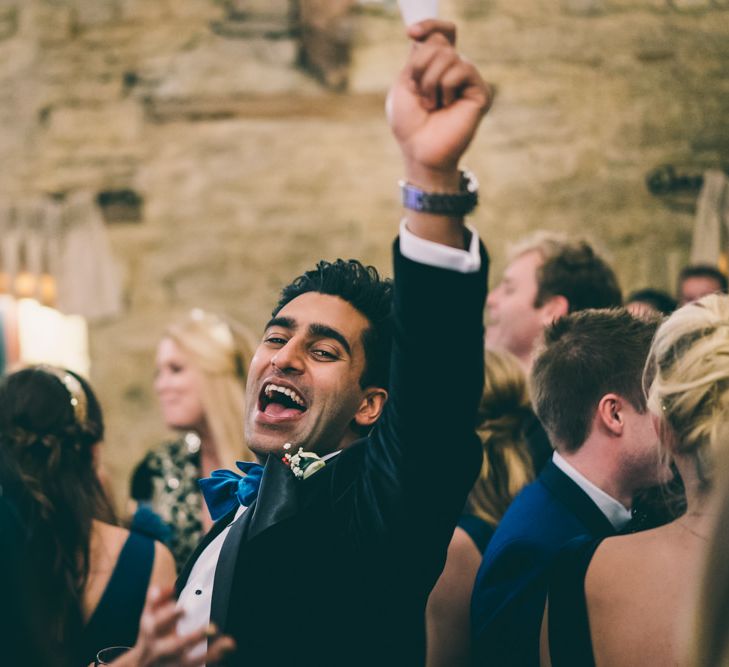 Groom having a good time on the dance floor 