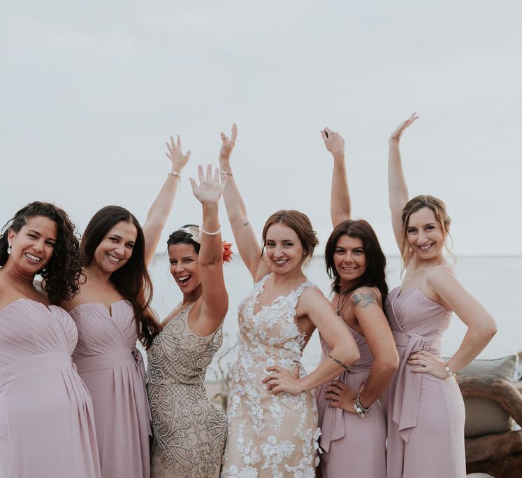 Bridesmaid in pink dresses for destination wedding 