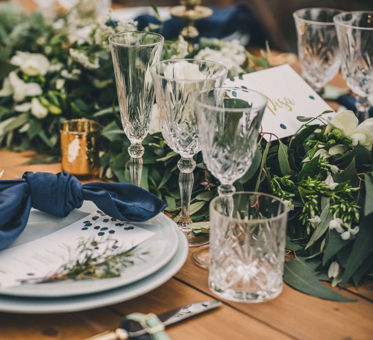 Luxe blue tablespace with crystal cut stemware for Tuscany Italy Wedding 