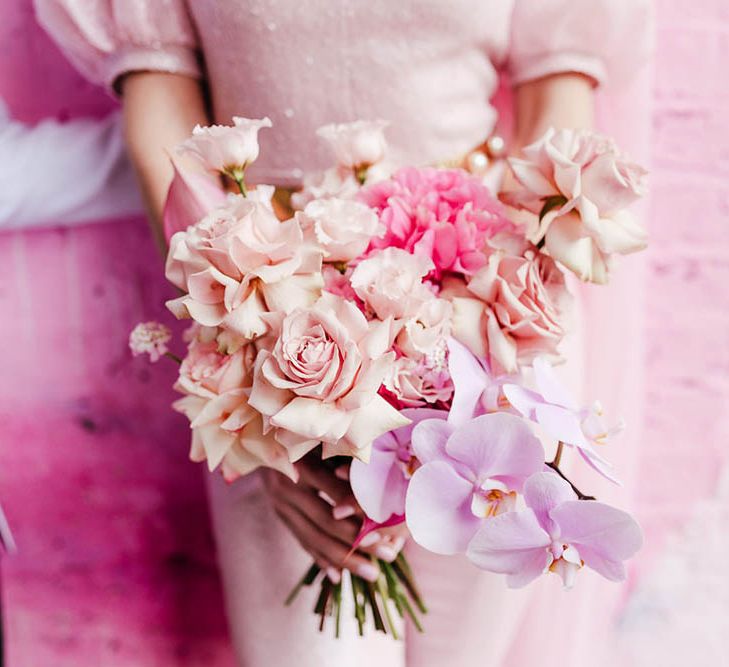 Blush pink and lilac pastel wedding bouquet with roses and orchids 