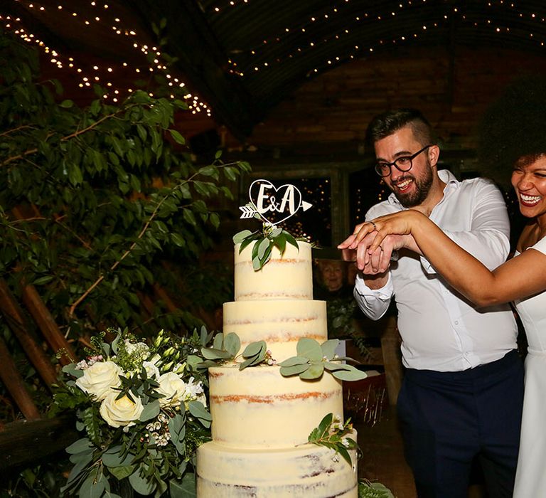 Bride & groom cut their wedding cake