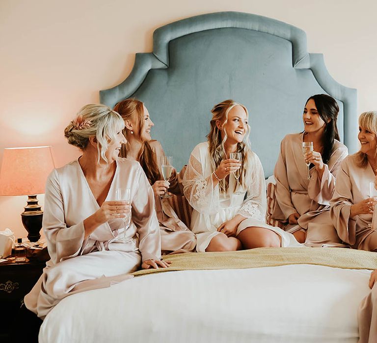 Bridesmaids in matching getting ready robes