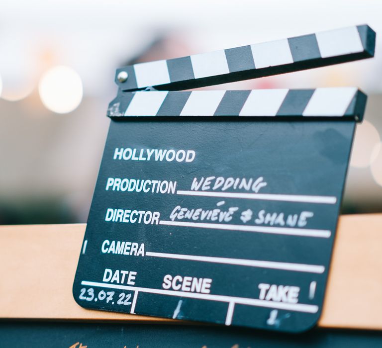 Chalkboard clapperboard with personalised writing 