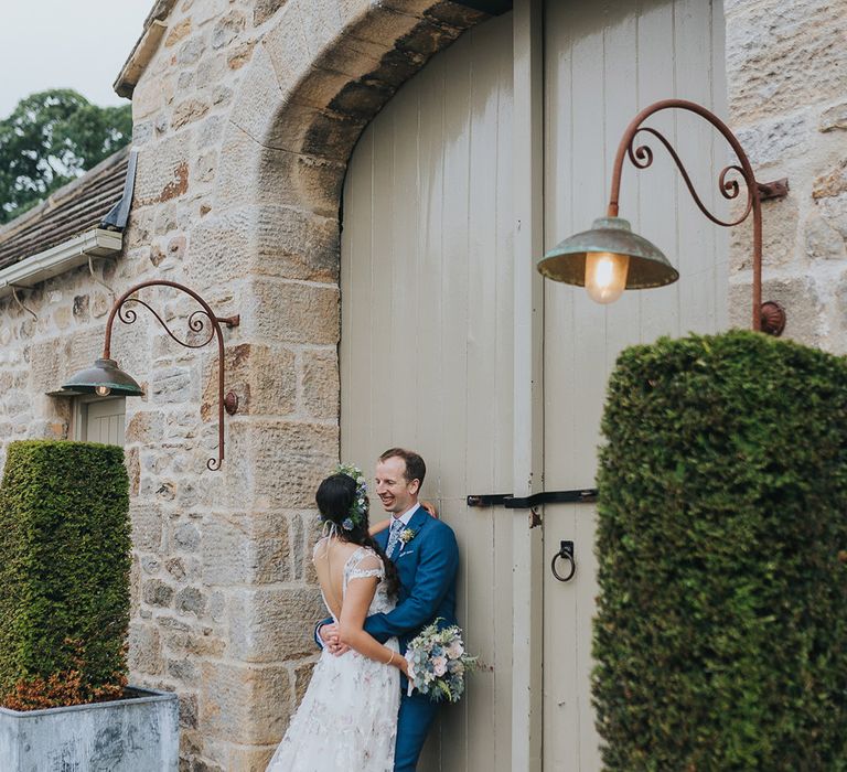 The Tithe Barn Bolton Abbey wedding with bride in a floral Savin London Amelia dress