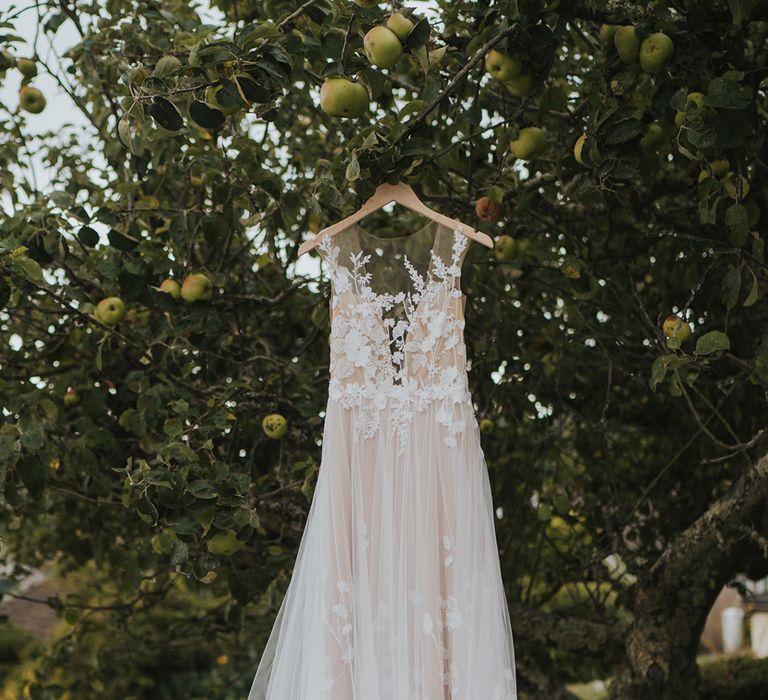 The bride's romantic tulle Anna Kara wedding dress for rustic home marquee wedding 