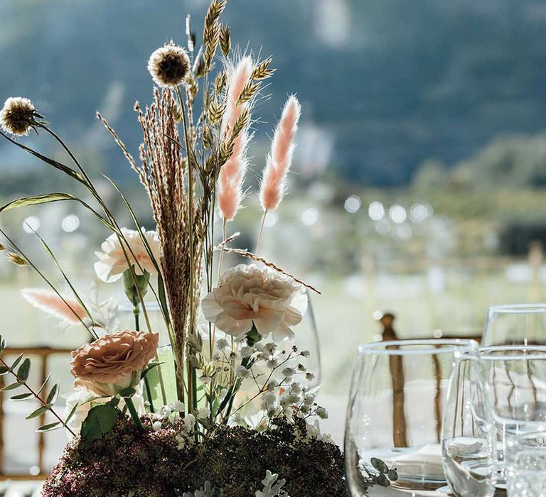 tall fresh and dried flower wedding centrepiece display 