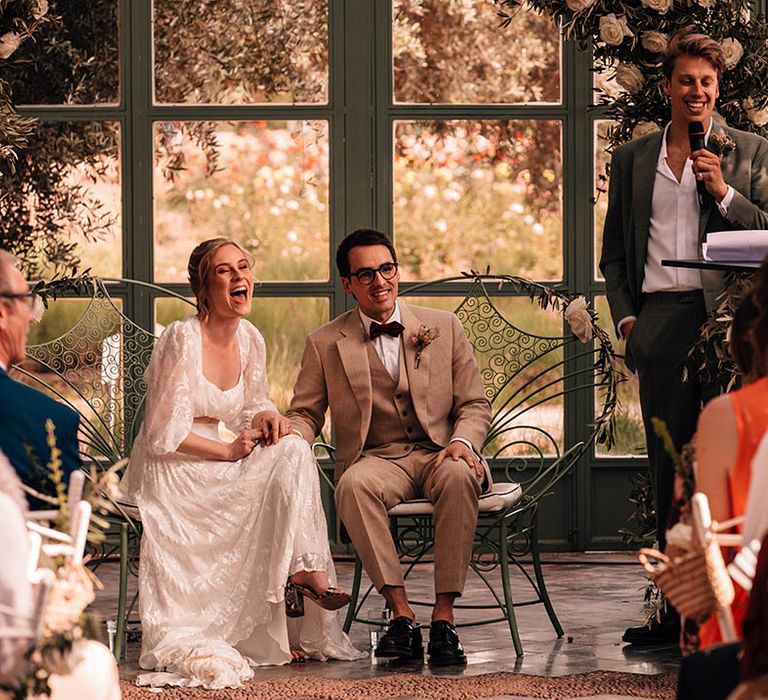 Three members of the wedding party stand up during the ceremony to read out their wedding speeches and readings 