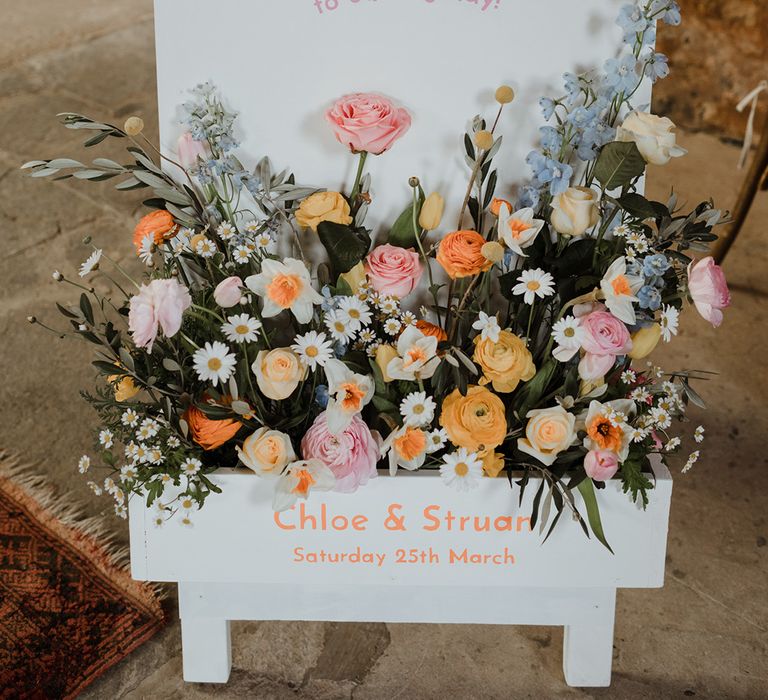 Wedding welcome sign with pastel wedding flowers for spring wedding in Scotland 