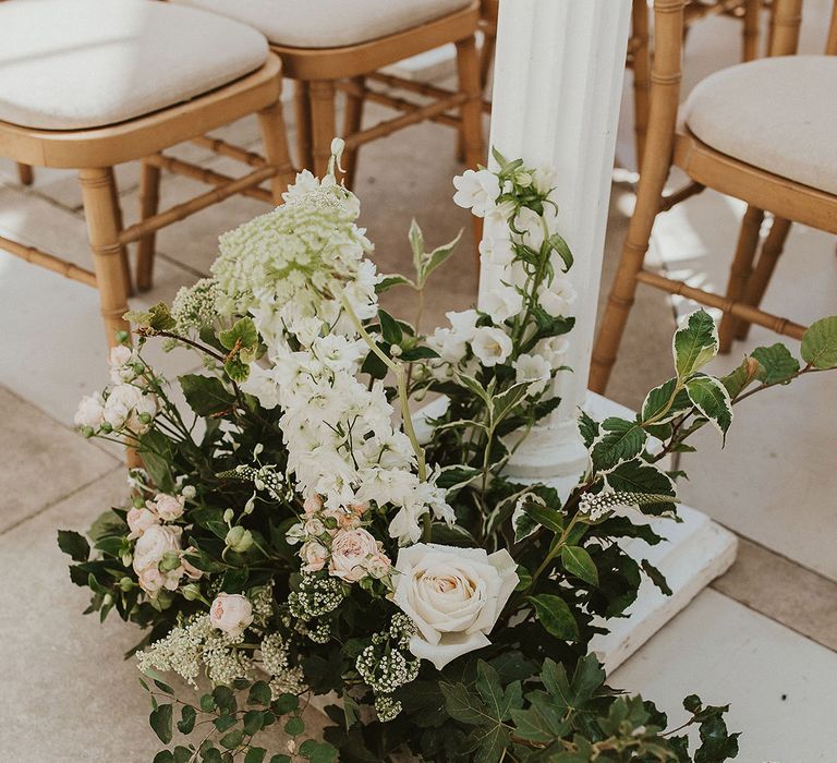  Light pink and white wedding aisle flowers with roses and bell flowers for botanical vibes | Steph Newton Photography