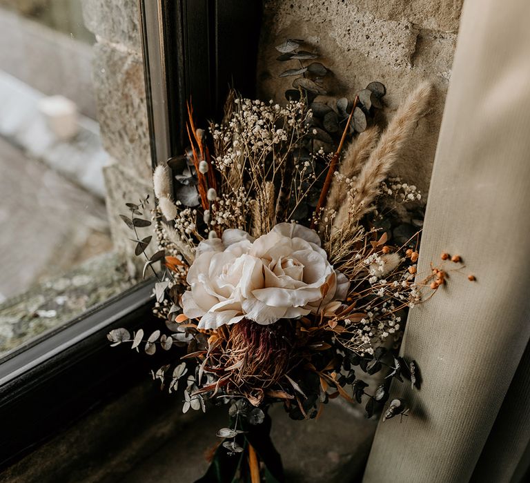 Neutral wedding bouquet made from dried wedding flowers for the brides 