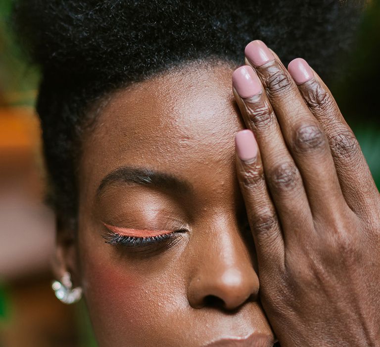 Bride with mauve pink square nails with pink eyeliner design 