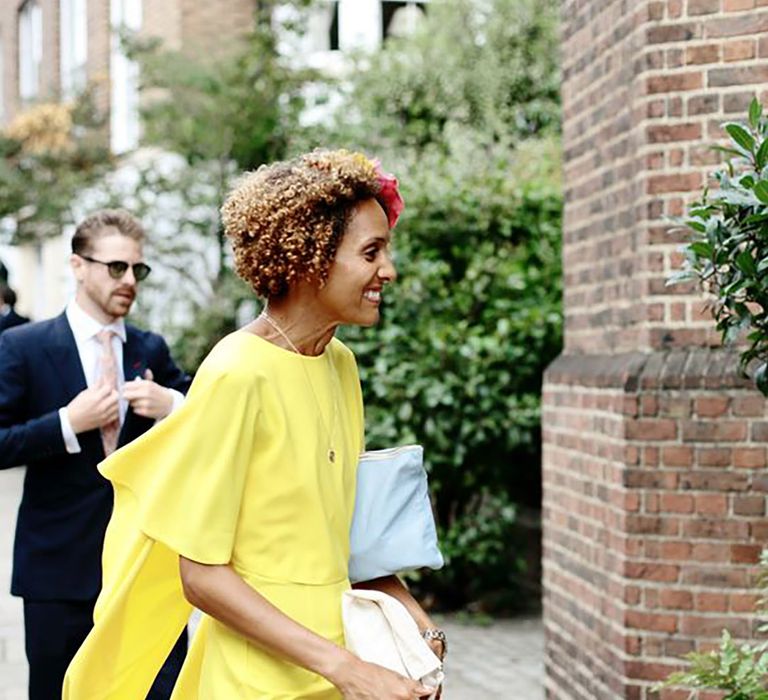 Yellow wedding guest dress by Dasha Caffrey Photography