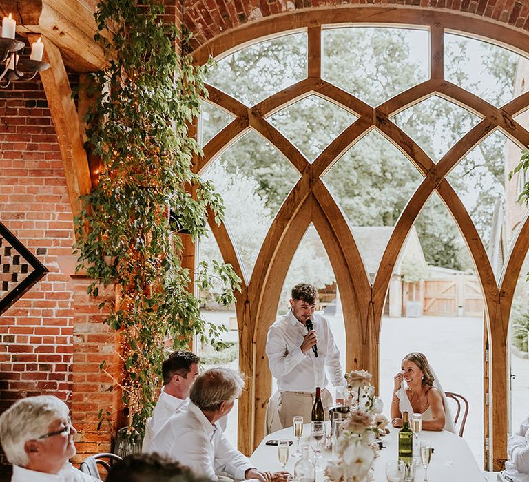 Groom reads out wedding speech 