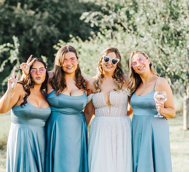 blue-satin-bridesmaid-dresses-Jessica-Ghansah-Weddings