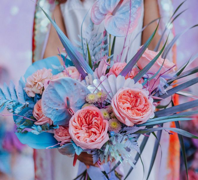 pastel wedding bouquet with spray painted anthuriums and grasses 