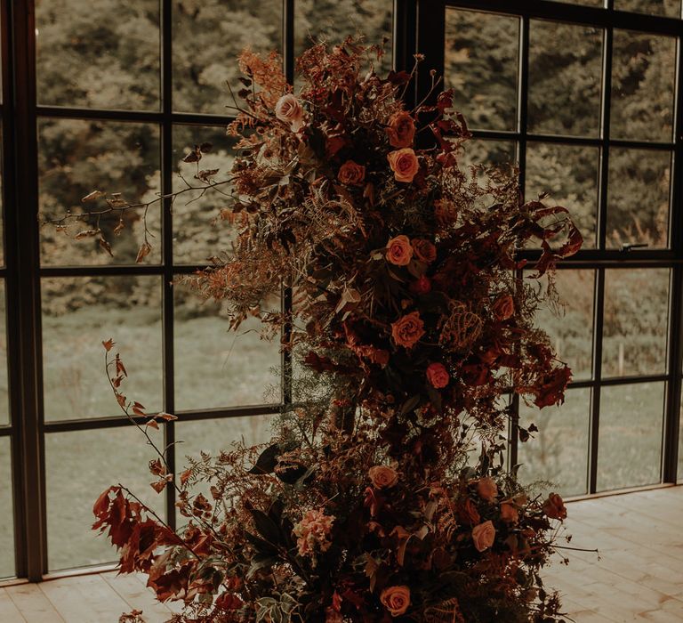 Vertical autumn wedding flower arrangement 