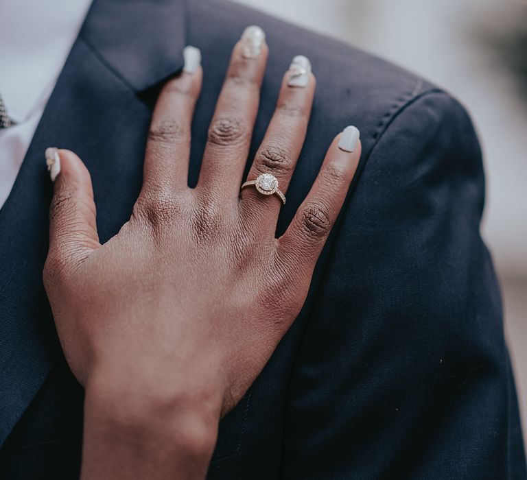 Bride wears diamond engagement ring