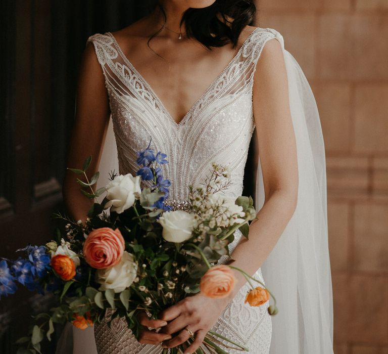 Bride wearing Eliza Jane Howell wedding dress with intricate panelled bead and sequin detailing