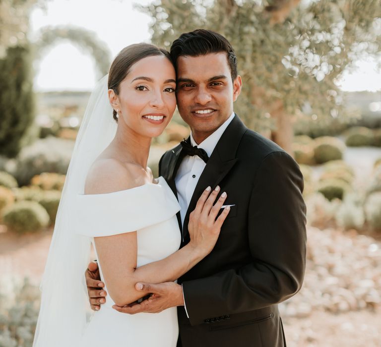 Bride & groom smile at the camera on their wedding day in Greece | Hannah MacGregor Photo & Film