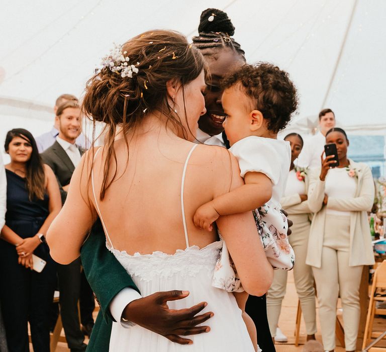 First dance with two brides and their daughter at Tremenheere Sculpture Gardens wedding 