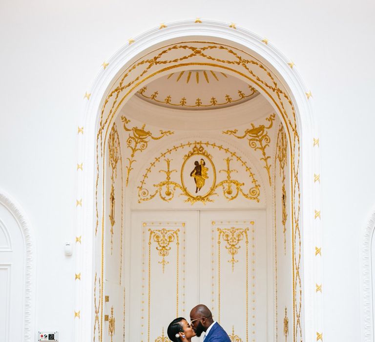 Bride & groom kiss on their wedding day