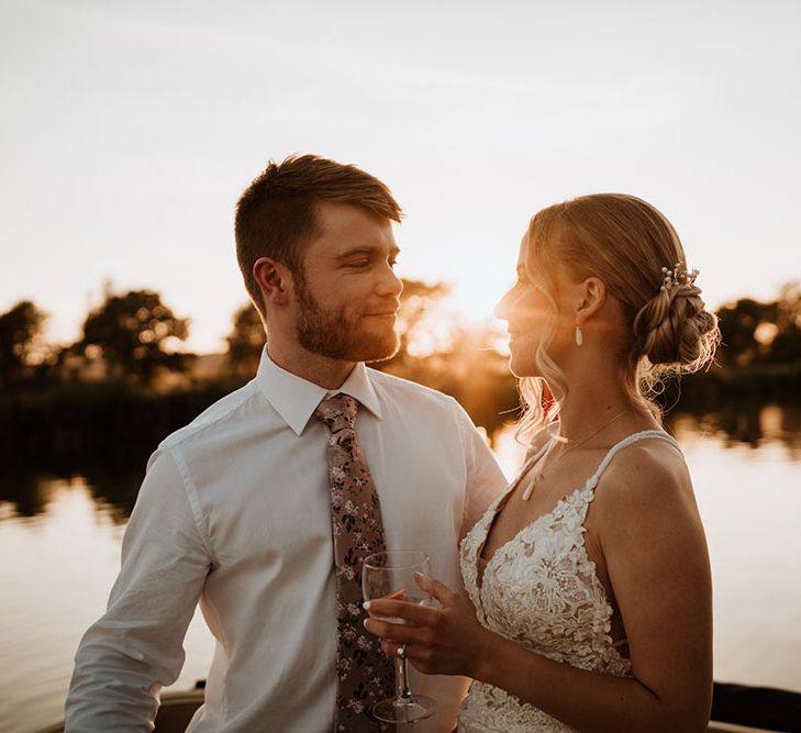 Golden hour couples portraits beside the Thames 