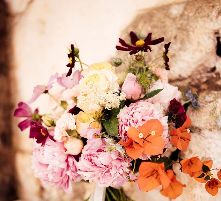 Pink, orange, white and red wedding bouquet 