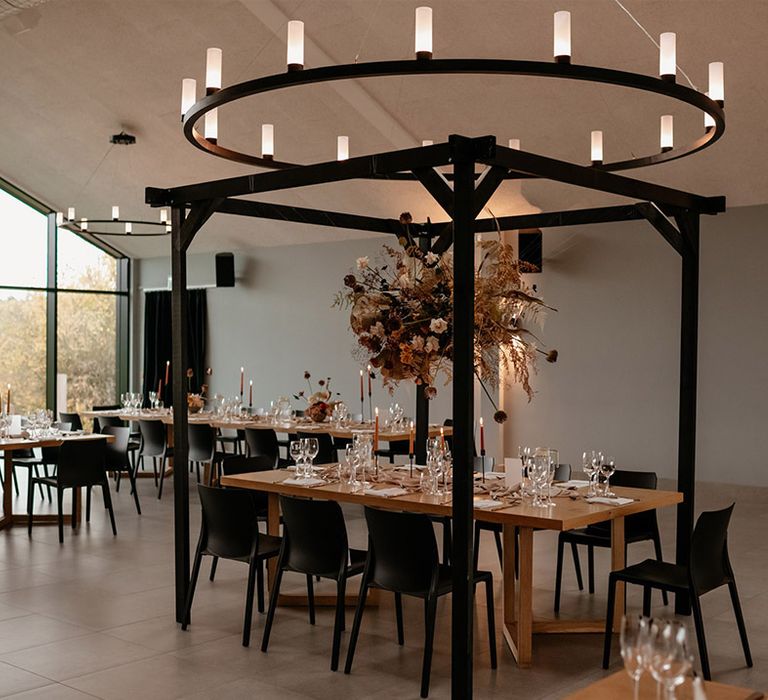 Black cabana over the top table with an epic dried flower cloud installation for an autumnal wedding 