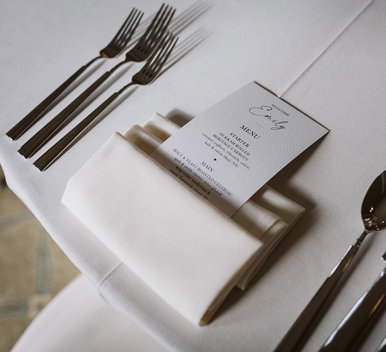 Simple minimalist white wedding place setting at Bowcliffe Hall country house wedding venue in West Yorkshire 