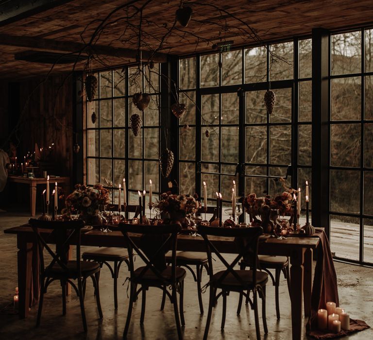 Hanging twig and bauble table installation for Christmas wedding inspiration 