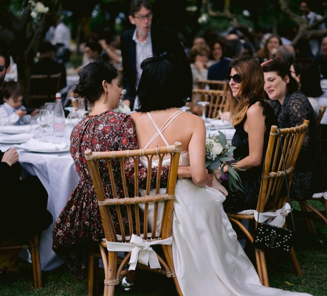 Bride mingling with her guests during the wedding breakfast 