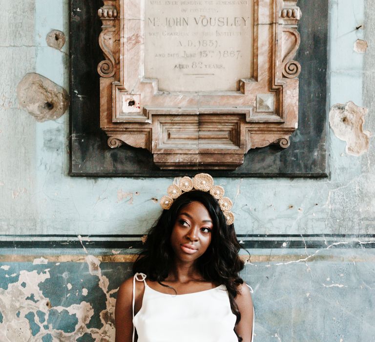 Bride in casual wedding dress with wicker bridal crown 