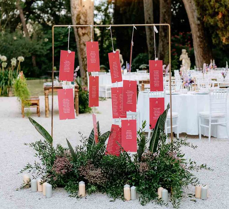 Hanging wedding table plan for romantic Italian wedding outdoors