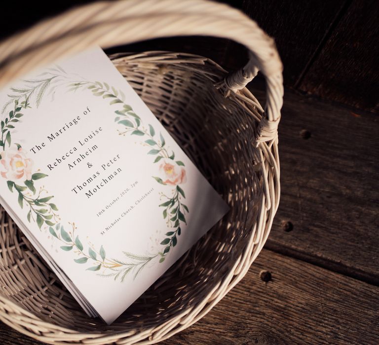 Wedding stationery in weaved basket