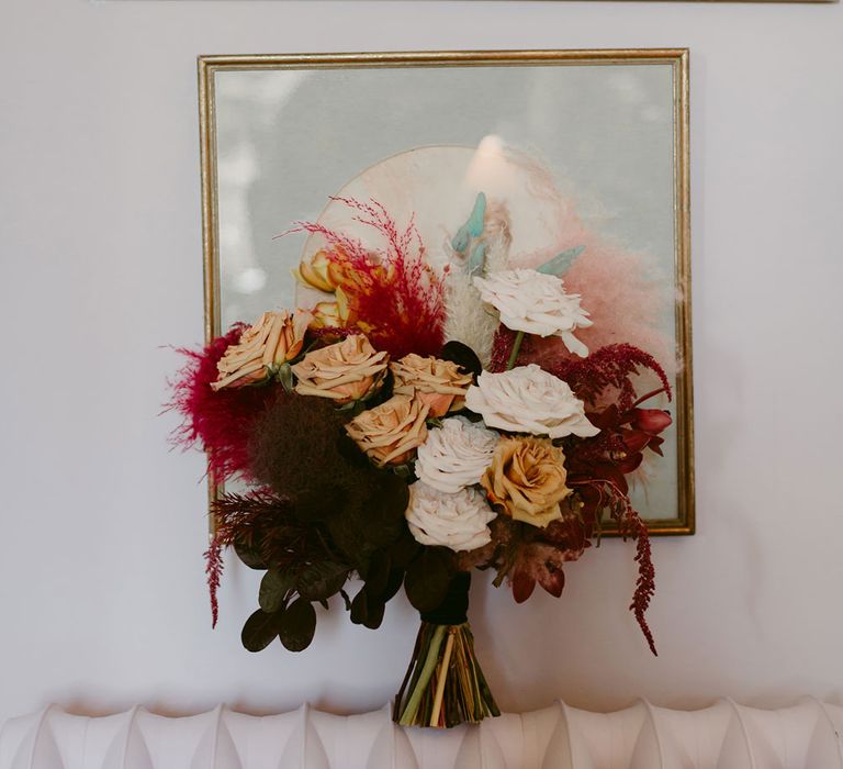 Pink, white and orange pampas grass and rose wedding bouquet 